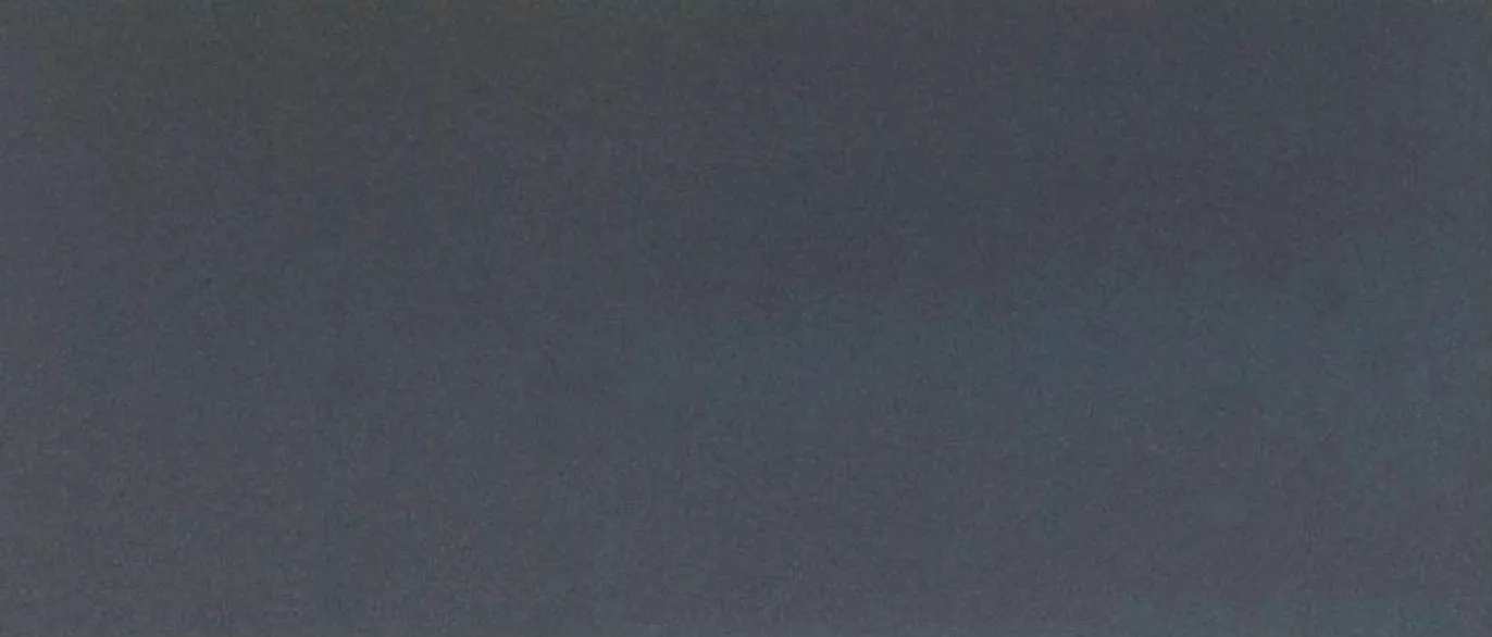Metal panel swatch in Jade Sand Deep Gray.