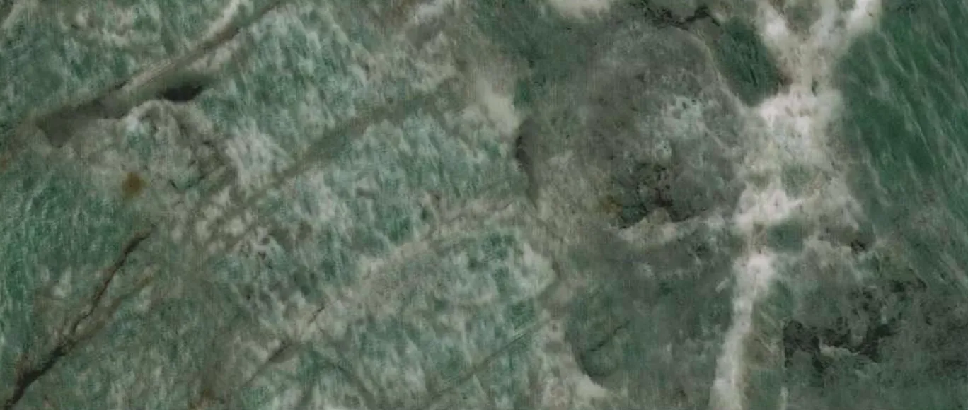 High-gloss marble-effect panel swatch in The Wizard of Oz Slate.