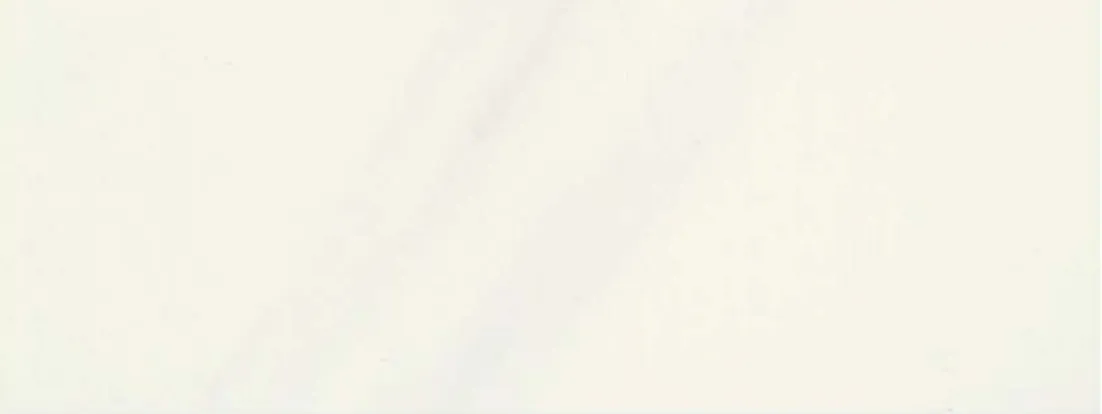 Marble-effect panel swatch in near-white with a faint olive tint.